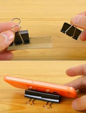 use a binder clips as a stand for phone to watch videos easily